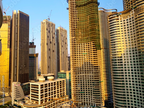 Sunset reflecting on a High rise building of mumbai, Lodha World one. photo