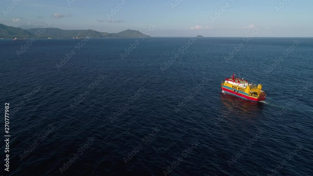 Aerial view of ferry sailing in ocean. Travel Vacation Recreation Paradise Tourism. Aerial view of ferry sailing in ocean. Travel Vacation Recreation Paradise Tourism.