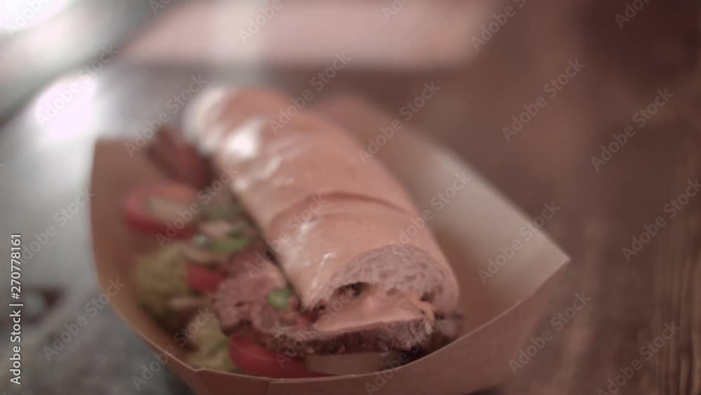 Dolly shot of sandwich on bar counter Dolly shot of sandwich on bar counter
