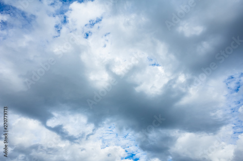 The sky in the clouds with the sunlight. The texture of the clouds, the background image. 