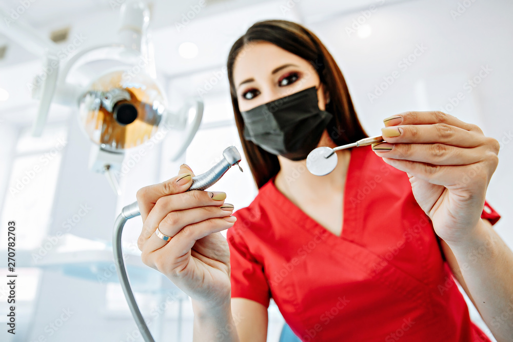 Patient point of view of a dentist examining patient mouth, modern dentistry concept. Patient point of view of a dentist examining patient mouth, modern dentistry concept.