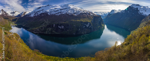 Famous Geiranger fiord in Norway. Spring time beautiful weather and colours.