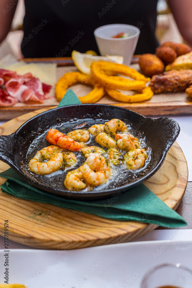 Plate of fried spiced prawns