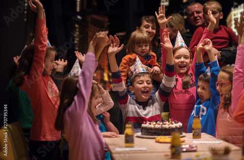 Obraz na plátne happy young boy having birthday party