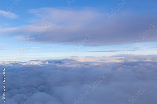 Beautiful sunset cloudy sky from aerial view. Airplane © arter photo 