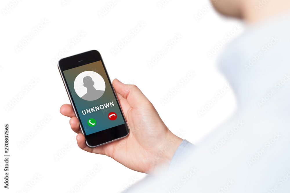 Hand with smartphone and unknown incoming phone call on it. Hand holding a smart phone and the phone ringing tube. Hand with smartphone and unknown incoming phone call on it. Hand holding a smart phone and the phone ringing tube.