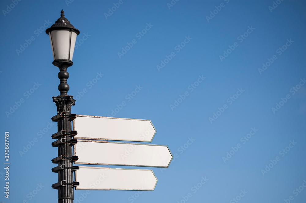 Street signposts template with a light on the sky.