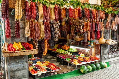 Georgia, the local bazaar. Sale of national sweets from grapes and nuts - 