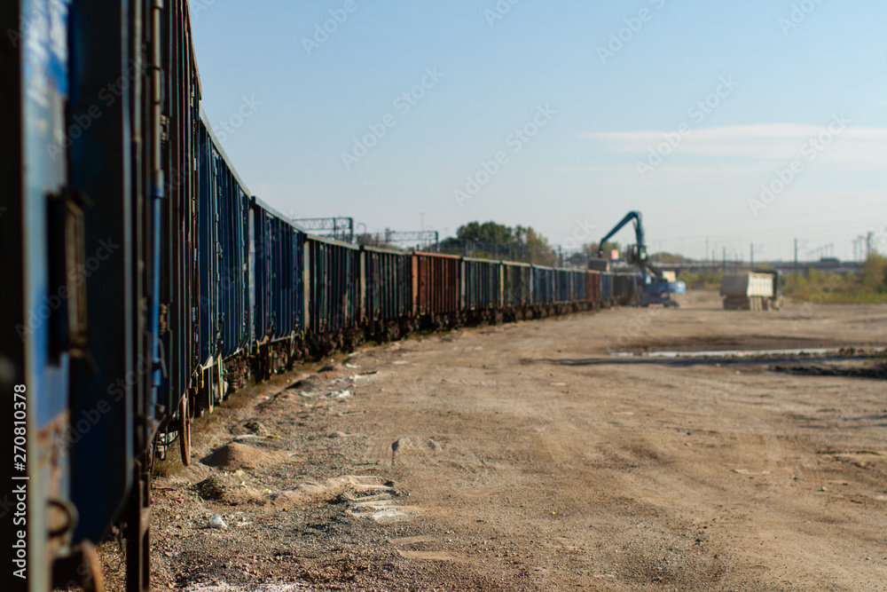 Fototapeta premium Loading a freight train on the siding.
