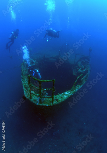 Boga shipwreck. The artificial reef. Underwater treasure. Diving, divers, wide angle underwater photography.
