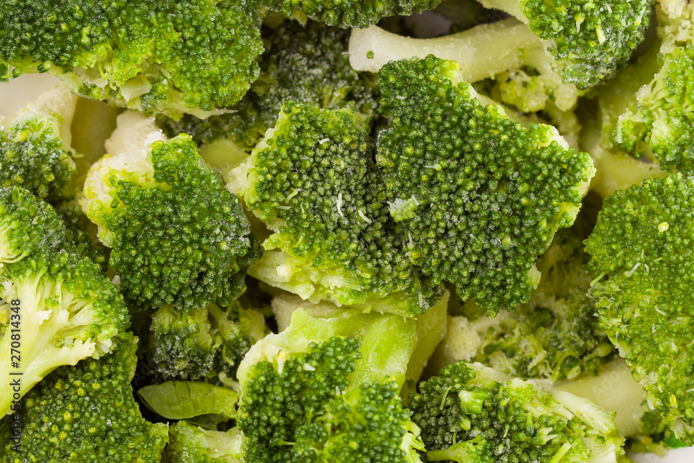 frozen green broccoli top view background. Top view, flat lay, copy space frozen green broccoli top view background. Top view, flat lay, copy space