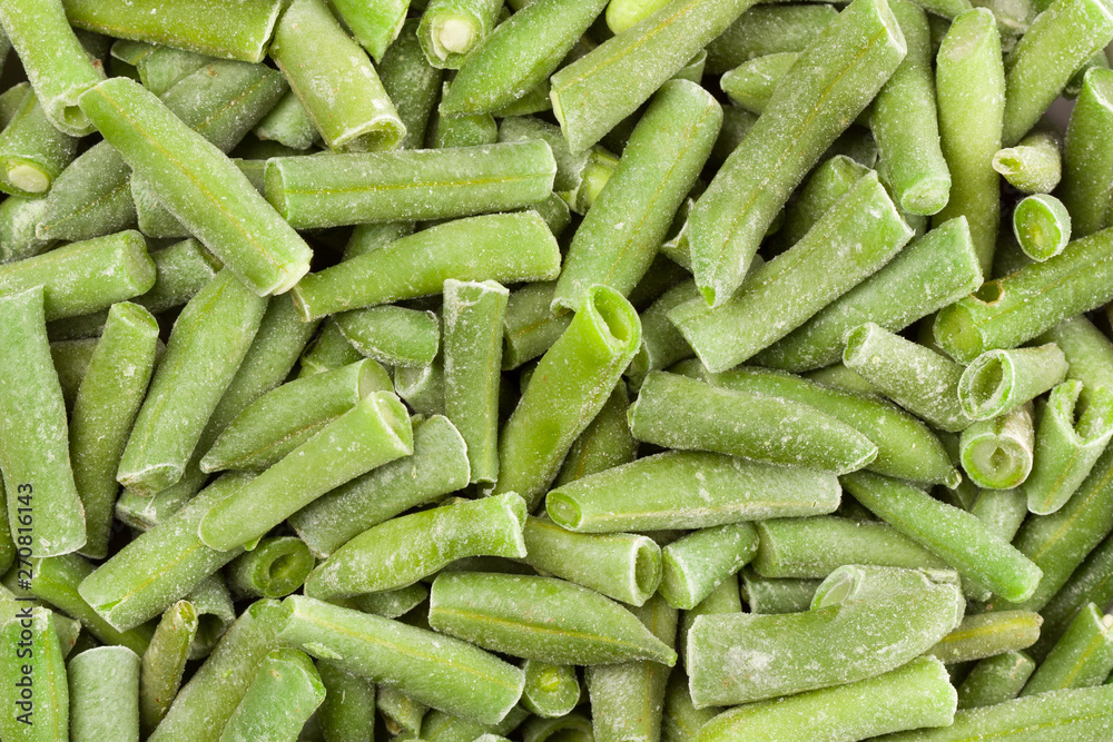 Close up of frozen green beans. Whole background. Close up of frozen green beans. Whole background.