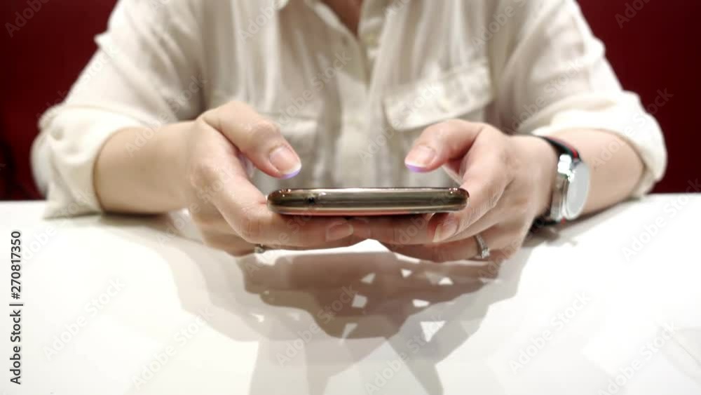 Woman hand using smart phone. Woman hand using smart phone.