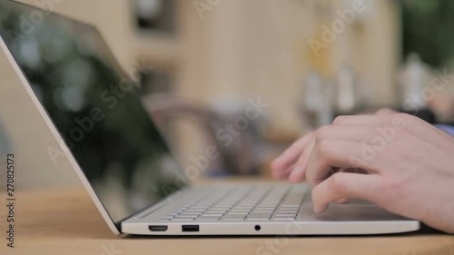 Typing on Laptop Keyboard, Outdoor photo