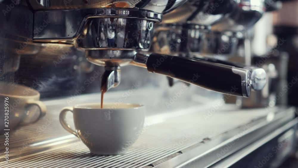 Coffee machine making espresso in a cafe