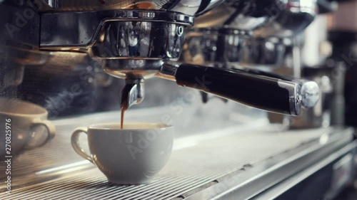 Coffee machine making espresso in a cafe