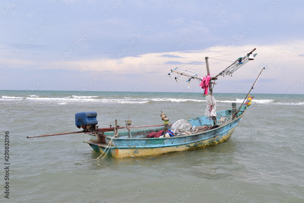 Fishing boat anchor on the beach