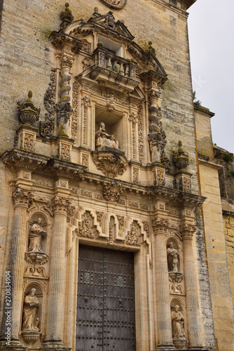 18th century sculptures at the front door of Saint Peter Church in Arcos de la Frontera Spain