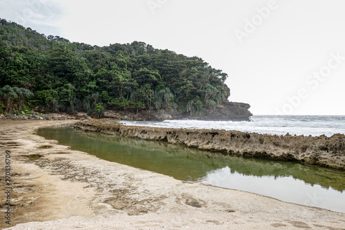 Beautiful landscape of Batu Bengkung Beach in Malang  East Java  Indonesia. Scenic view of beach