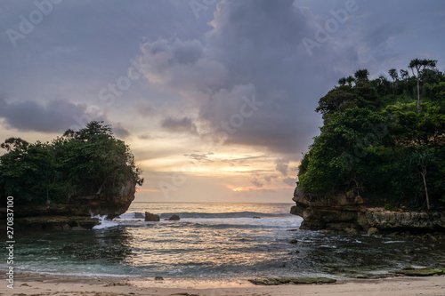 Beautiful landscape of Batu Bengkung Beach in Malang, East Java, Indonesia. Scenic view of beach photo