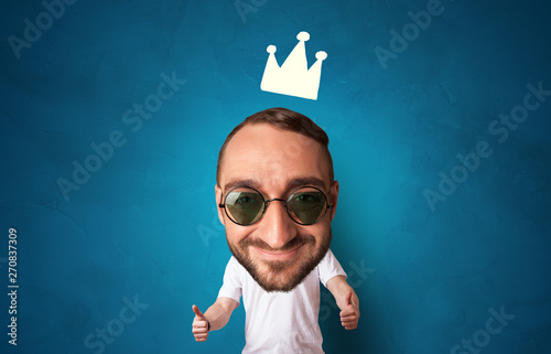 Funny person with big head and drawn crown
 photo