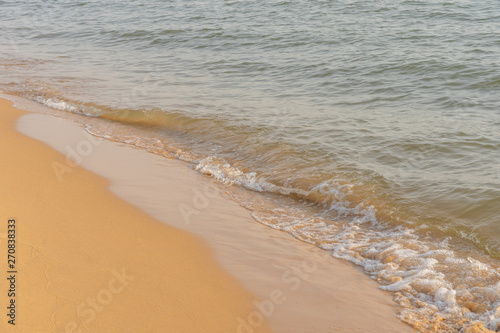 Peaceful beach with some small waves background