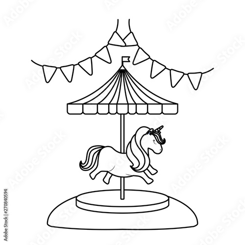 carousel with unicorn and garlands hanging
