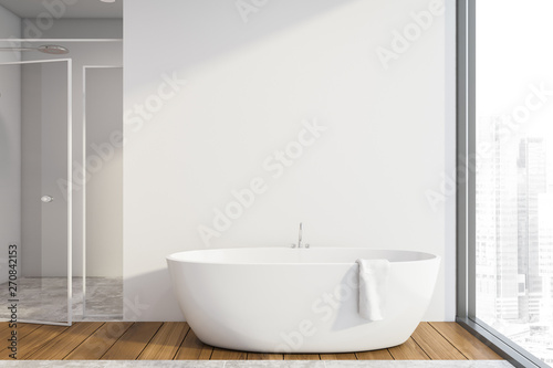 White bathroom interior, tub and shower © ImageFlow