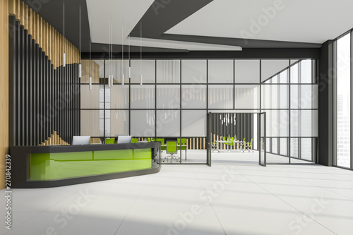 Green reception desk in open space office