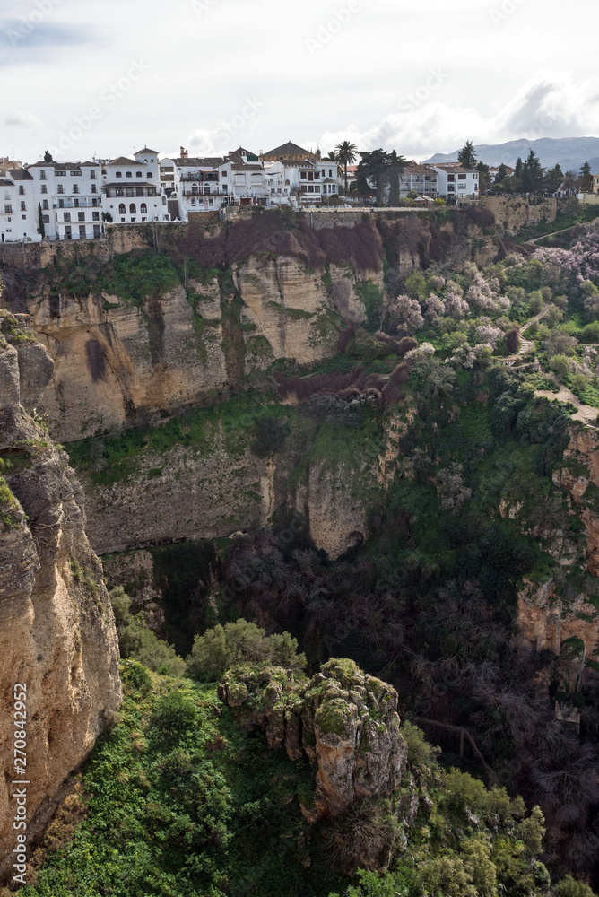 City of Ronda in the Spanish province of Malaga in Andalusia. Beautiful view of the mountains, the observation deck and the valley. Gorge