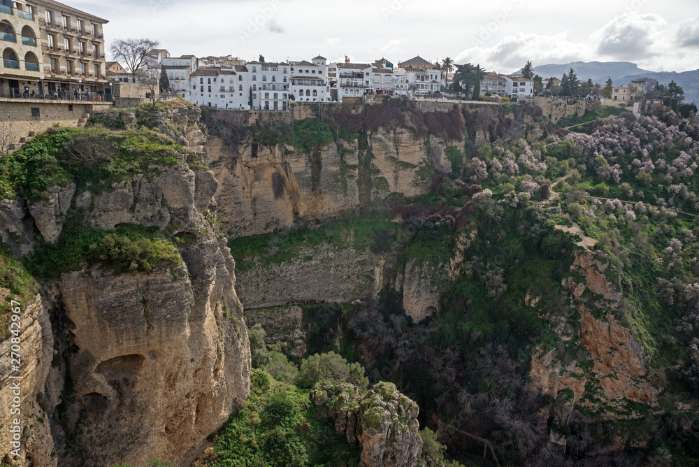 City of Ronda in the Spanish province of Malaga in Andalusia. Beautiful view of the mountains, the observation deck and the valley. Gorge