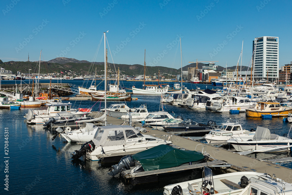 View of the marina and sailing boats. Yacht port located in the port of Bodo. Nordland. Norway.