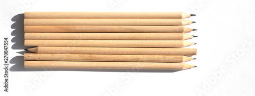 8 pencils are on the table in bright daylight. Natural unpainted wood. Eco-friendly materials. Not like everyone else