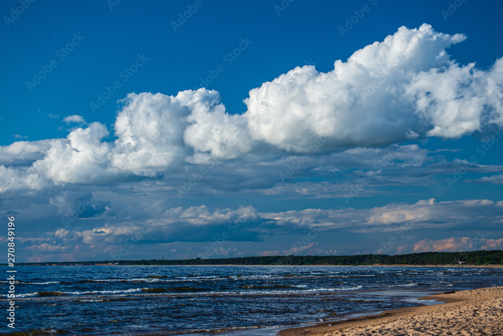clear sky with dramatic clouds over the lake in sunset clear sky with dramatic clouds over the lake in sunset