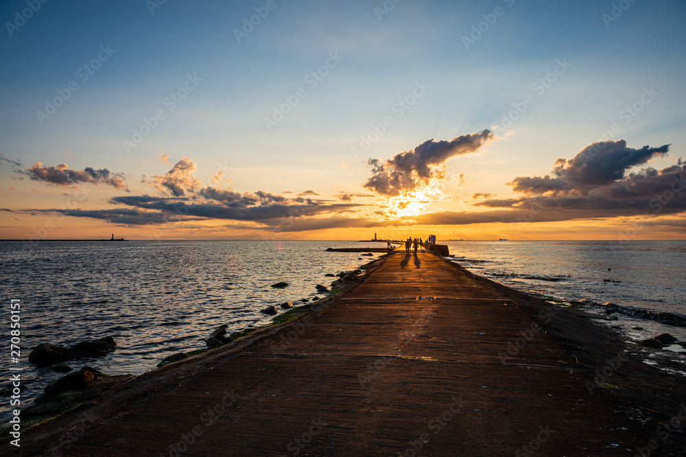 clear sky with dramatic clouds over the lake in sunset