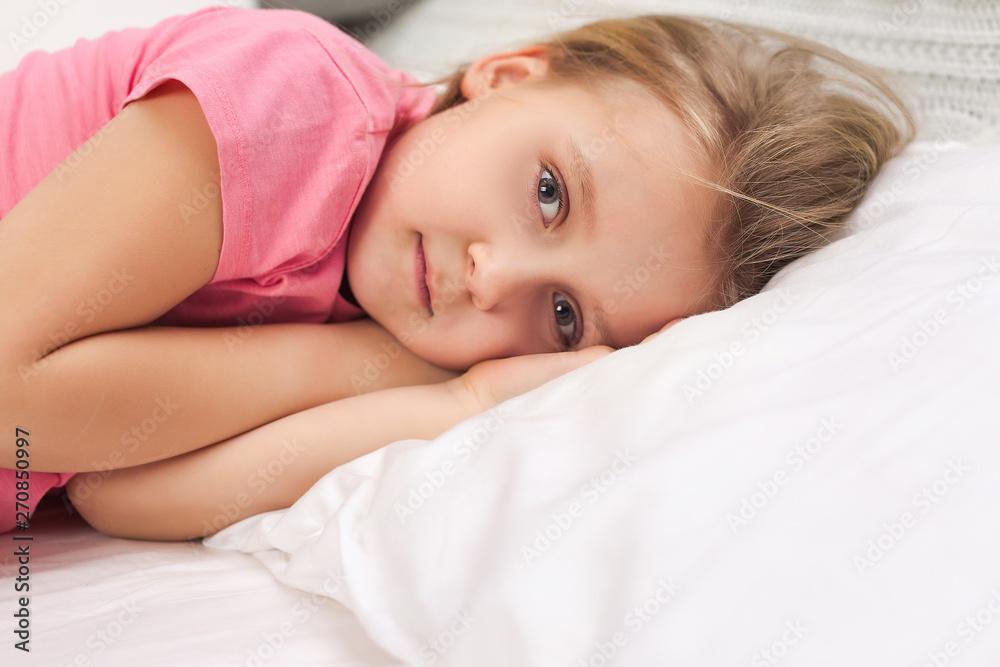adorable little child girl smiling after waking up in bed adorable little child girl smiling after waking up in bed