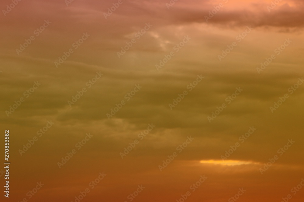 nice vivid sun colored clouds on the sky for using in design as background.