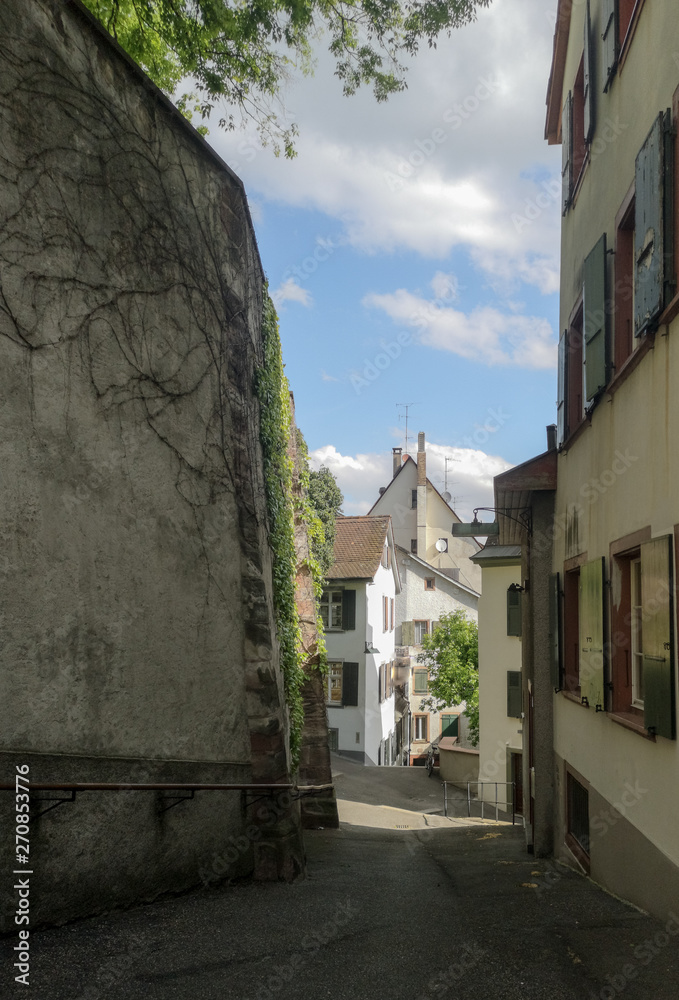 Old medieval streets of Basel in Switzerland during a warm spring morning