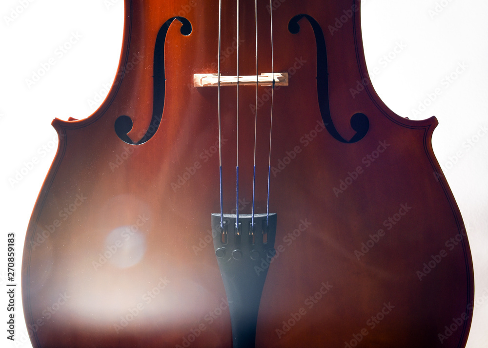 Cello in dramatic light and lens flare