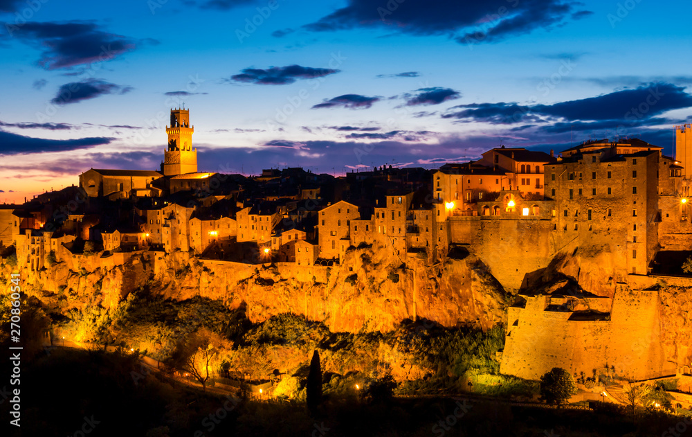 Stunning view of Pitigliano at dusk, mediaeval town in Tuscany, Italy