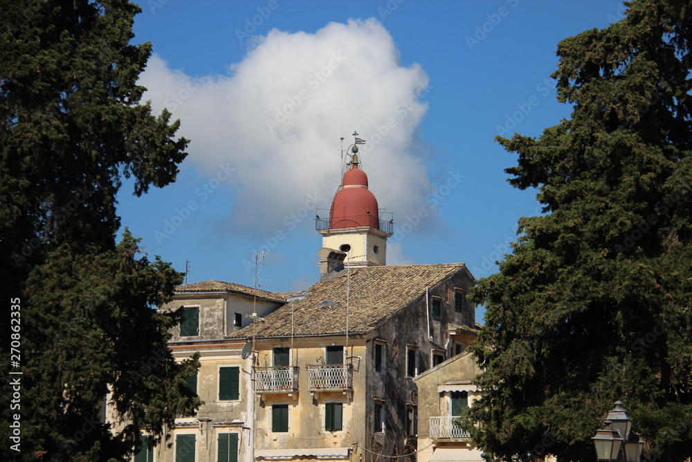 Historic Old Town And Bell Tower With Pine Tree In Corfu Greece During Summertime 