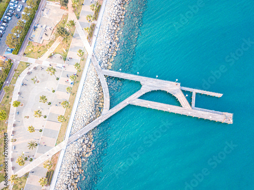 Aerial top down view of Limassol promenade and pedestrian sea bridge