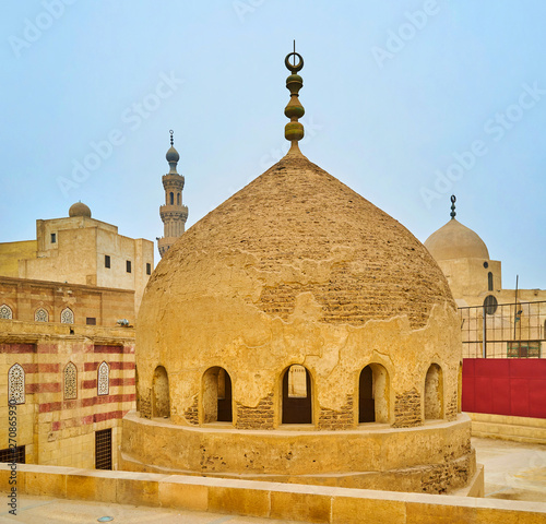 The shabby cupola of Amir Khayrbak complex, Cairo, Egypt photo