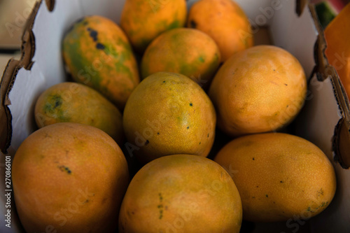 Delicious mangoes in a fruit shop