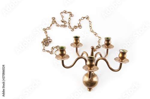 Antique candlestick on white