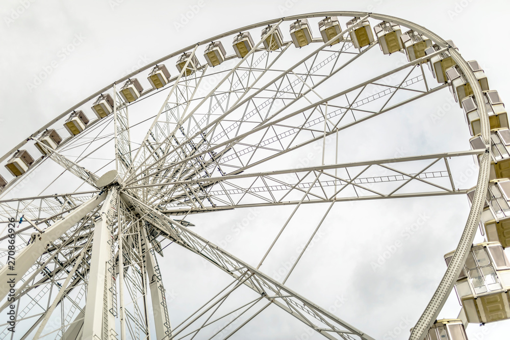 Famous ferris wheel Sziget Eye in Budapest over the grey sky backgound Famous ferris wheel Sziget Eye in Budapest over the grey sky backgound