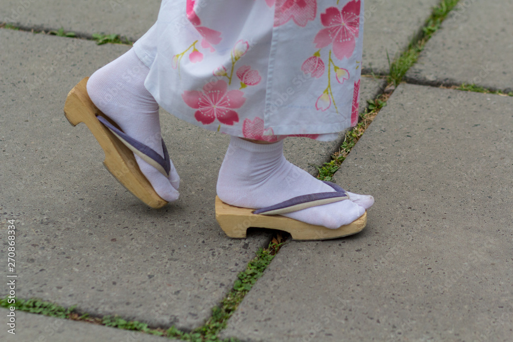 Girl In Kimono And Zori Sandal. Japanese Culture Stock Photo 