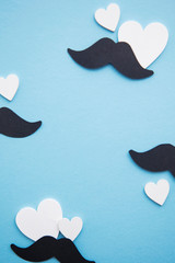 Black mustache with love hearts. Father's day or mens health concept