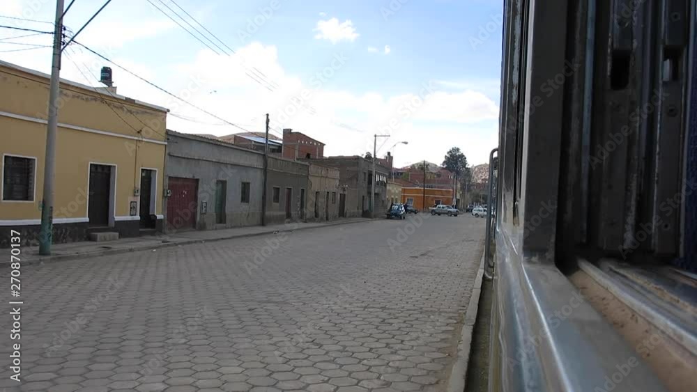 Oruro, Bolivia - 25. february 2014 point of view shot from the train - train passing through the village Oruro, Bolivia - 25. february 2014 point of view shot from the train - train passing through the village