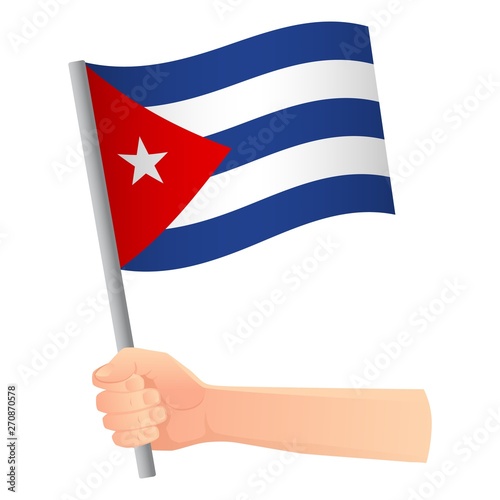 Cuba flag in hand © Visual Content